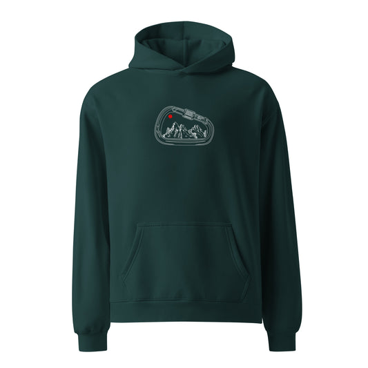 Green hoodie with a graphic design on the chest against a white background