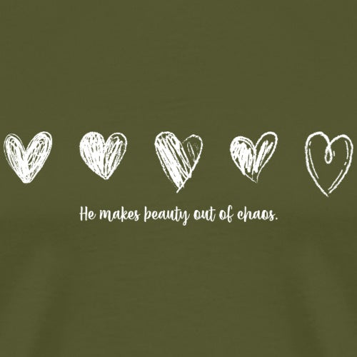 Green t-shirt with white heart illustrations and text 'He makes beauty out of chaos' on a solid background