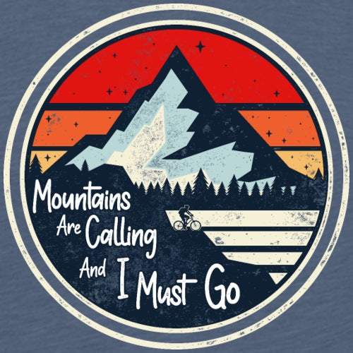 T-shirt design with mountain graphic and text 'Mountains Are Calling And I Must Go' on a blue background.