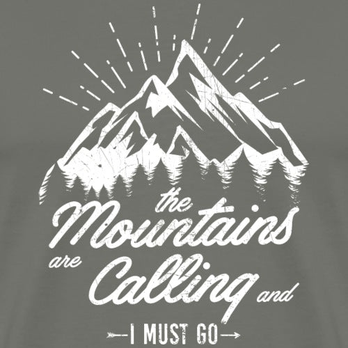 T-shirt with mountain graphic and text 'the Mountains are Calling and I Must Go' on a dark background