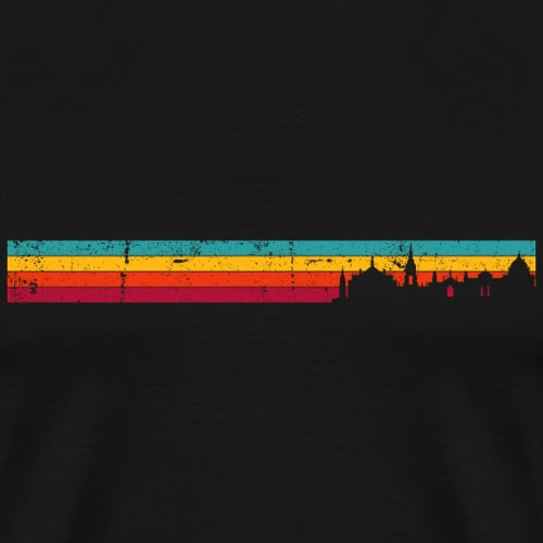 City skyline silhouette with a colorful horizontal stripe at the bottom on a black background