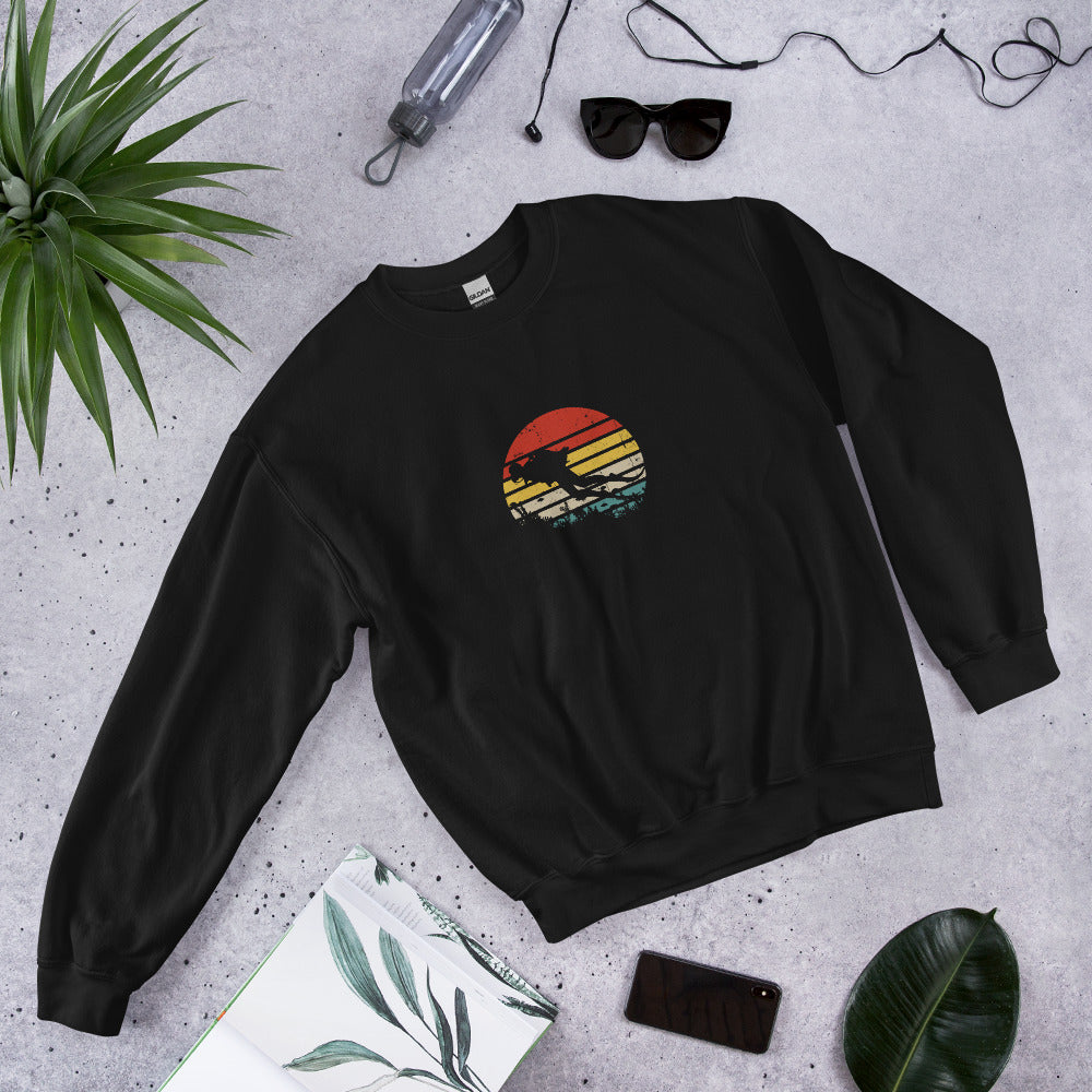 Unisex classic sweatshirt featuring a retro diving graphic, inspired by ocean exploration and vintage adventure style. Ideal for sea lovers and nostalgic outdoor enthusiasts.
