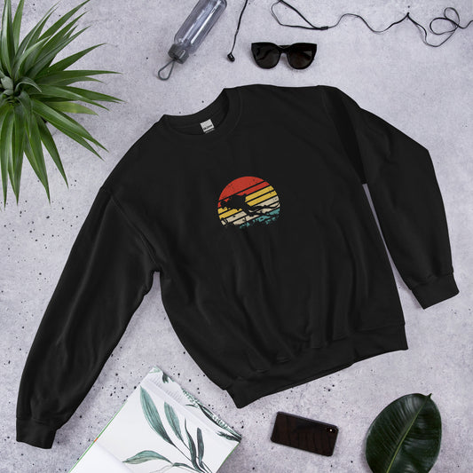 Unisex classic sweatshirt featuring a retro diving graphic, inspired by ocean exploration and vintage adventure style. Ideal for sea lovers and nostalgic outdoor enthusiasts.