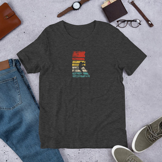 Dark grey t-shirt with graphic design of climbing on concrete surface with jeans, shoes and accessories.