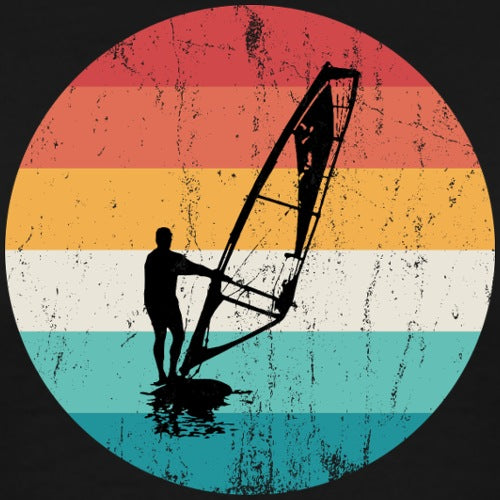 Silhouette of a windsurfer against a colorful, distressed circular background
